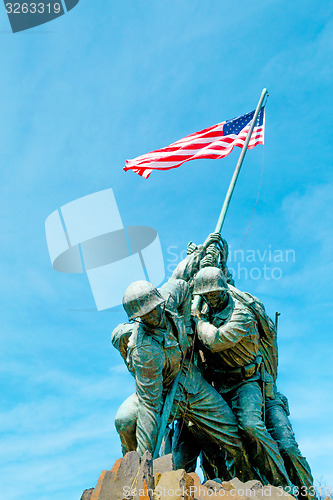 Image of Marine Corps War Memorial under a blue sky