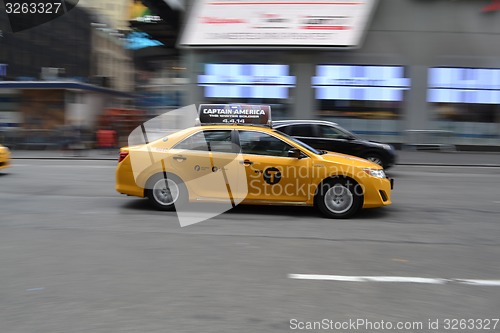 Image of NYC taxi in movement