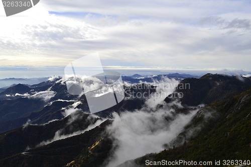 Image of Clouds on top of the mountains