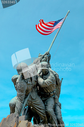 Image of American flag carried by soldiers