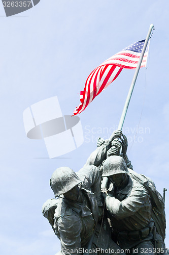 Image of Soldiers with the American flag