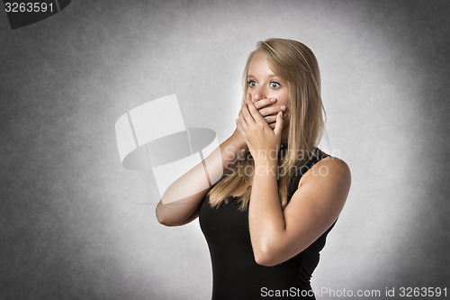 Image of Blond anxiously woman