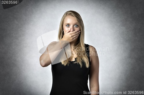 Image of Blond anxiously woman