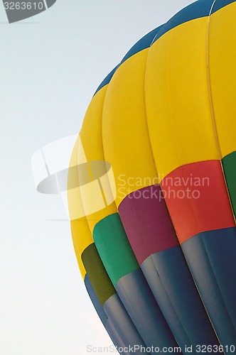 Image of rainbow colored hot air balloon