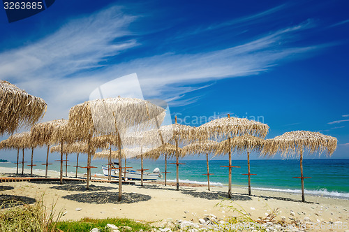 Image of Reed umbrellas on the beach