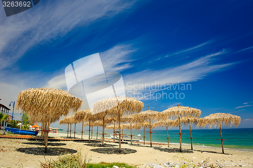 Image of Reed umbrellas on the beach