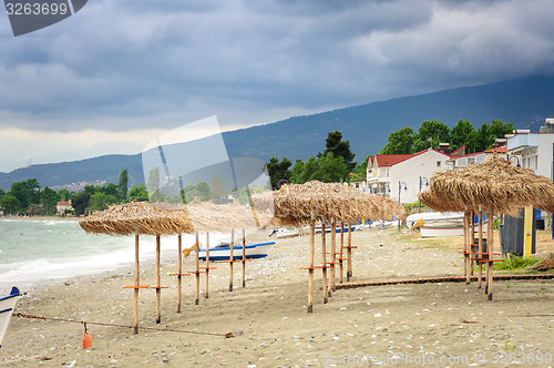Image of Reed umbrellas on the beach