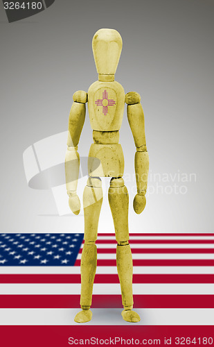 Image of Wood figure mannequin with US state flag bodypaint - New Mexico