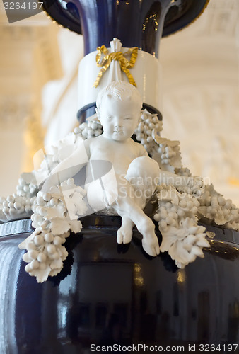 Image of Marble boy with hooves on the ancient vase