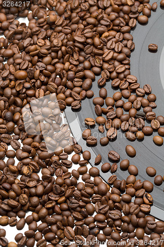 Image of Coffee beans and vintage vinyl record