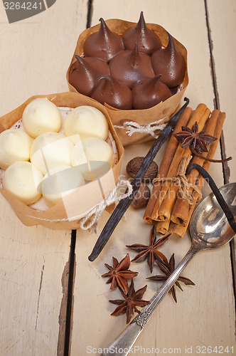 Image of chocolate vanilla and spices cream cake dessert 