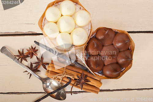 Image of chocolate vanilla and spices cream cake dessert 