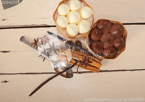 Image of chocolate vanilla and spices cream cake dessert 