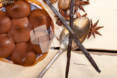 Image of chocolate vanilla and spices cream cake dessert