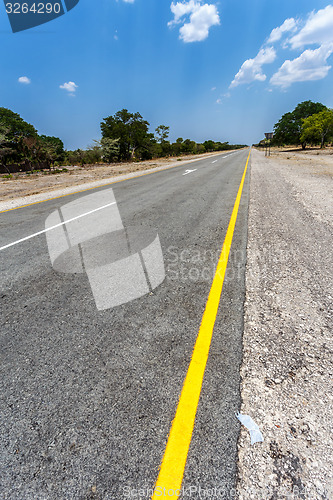 Image of Endless road with blue sky