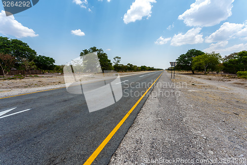 Image of Endless road with blue sky