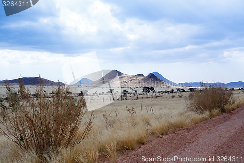 Image of endless road in Namibia moonscape landscape