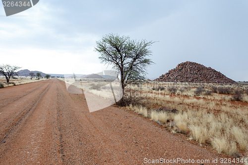 Image of endless road in Namibia moonscape landscape