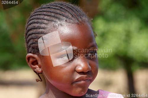 Image of Closeup portrait of small namibian child girl