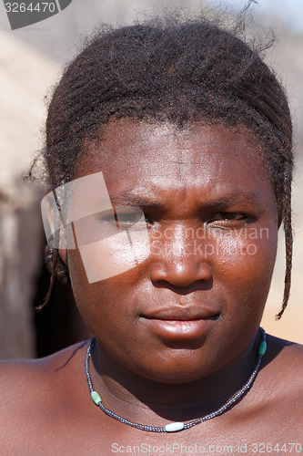 Image of Zemba woman with ornament on the neck in the village