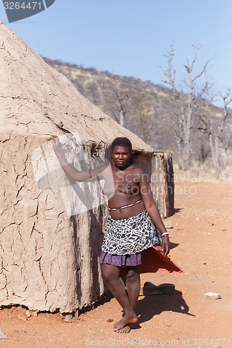 Image of Zemba woman with ornament on the neck in the village