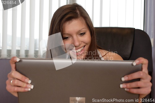 Image of Businesswoman with laptop