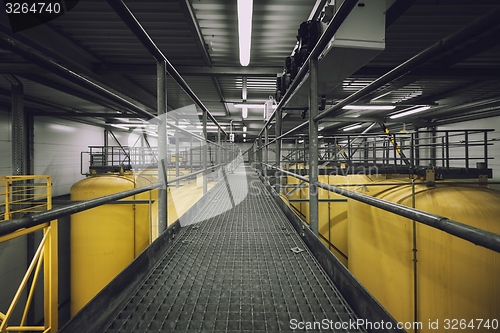 Image of Industrial interior with welded silos