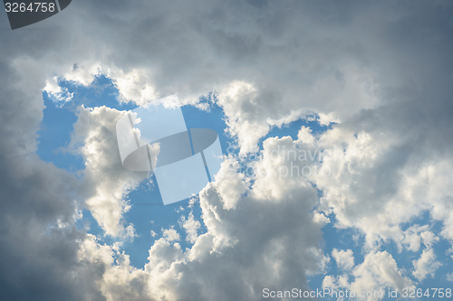 Image of Beautiful sky with fluffy clouds