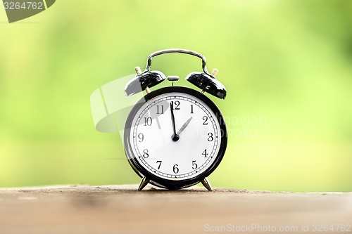 Image of Vintage background with retro alarm clock