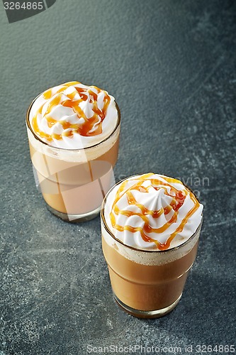 Image of two glasses of coffee with whipped cream