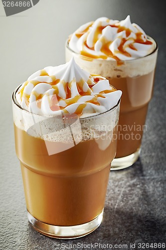 Image of two glasses of coffee with whipped cream