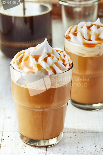 Image of two glasses of coffee with whipped cream