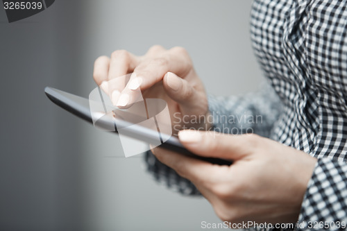 Image of Womanworking with digital tablet