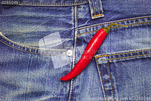 Image of hot chili peppers in a jeans