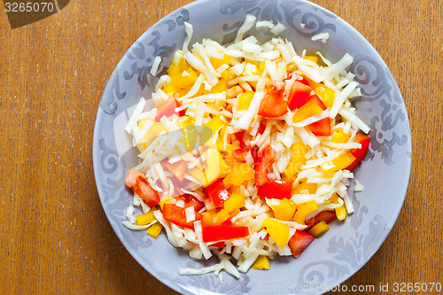 Image of Assorted salad with fresh vegetables in plate