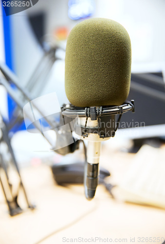 Image of microphone at recording studio or radio station