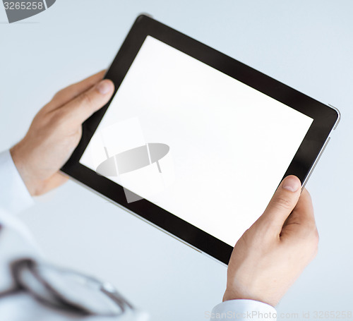 Image of male doctor holding tablet pc