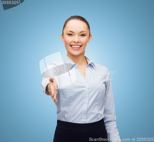 Image of businesswoman with opened hand ready for handshake