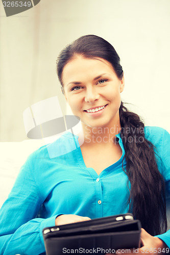 Image of happy woman with tablet pc computer