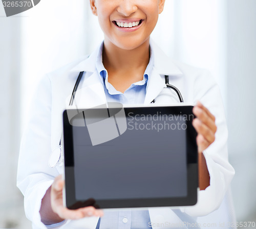 Image of african female doctor with tablet pc