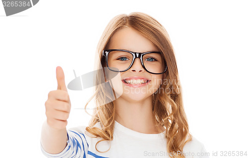 Image of little girl with black eyeglasses