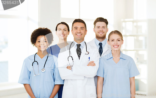 Image of group of happy doctors at hospital