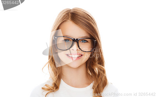 Image of smiling cute little girl with black eyeglasses