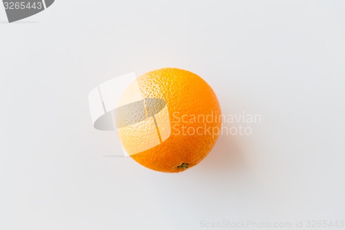 Image of ripe orange over white