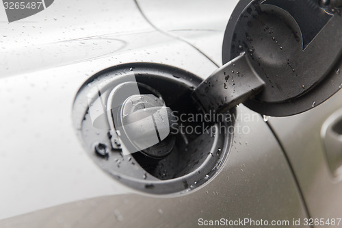 Image of close up of car open fuel tank