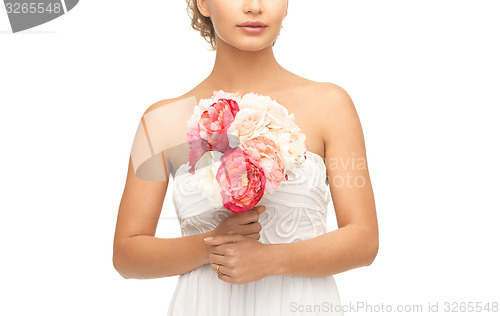 Image of woman with bouquet of flowers