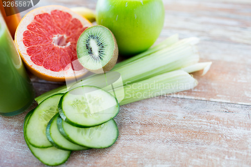 Image of close up of ripe fruits and vegetables on table