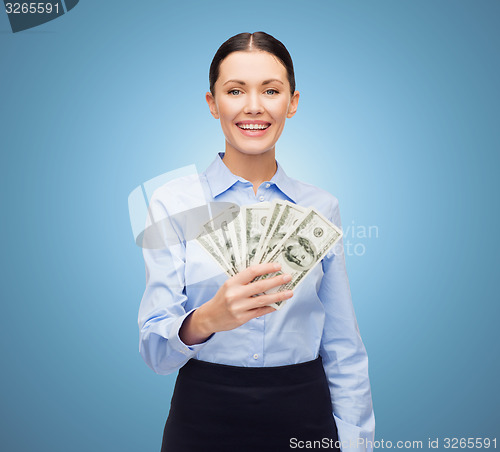 Image of businesswoman with dollar cash money