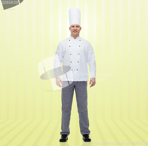 Image of happy male chef cook