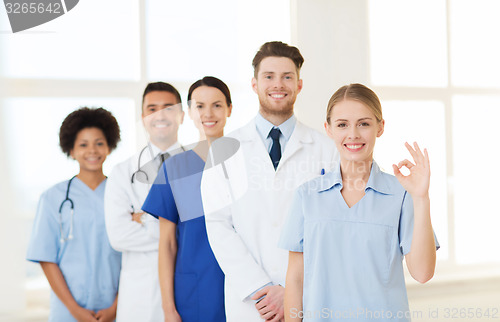 Image of group of doctors and nurses at hospital